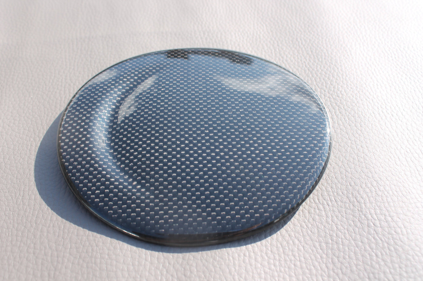 Carbon fiber fuel cap cover for Ferrari 488 GTB 2015-2017 from Tuning Shop, featuring high-quality carbon construction and a sleek finish.
