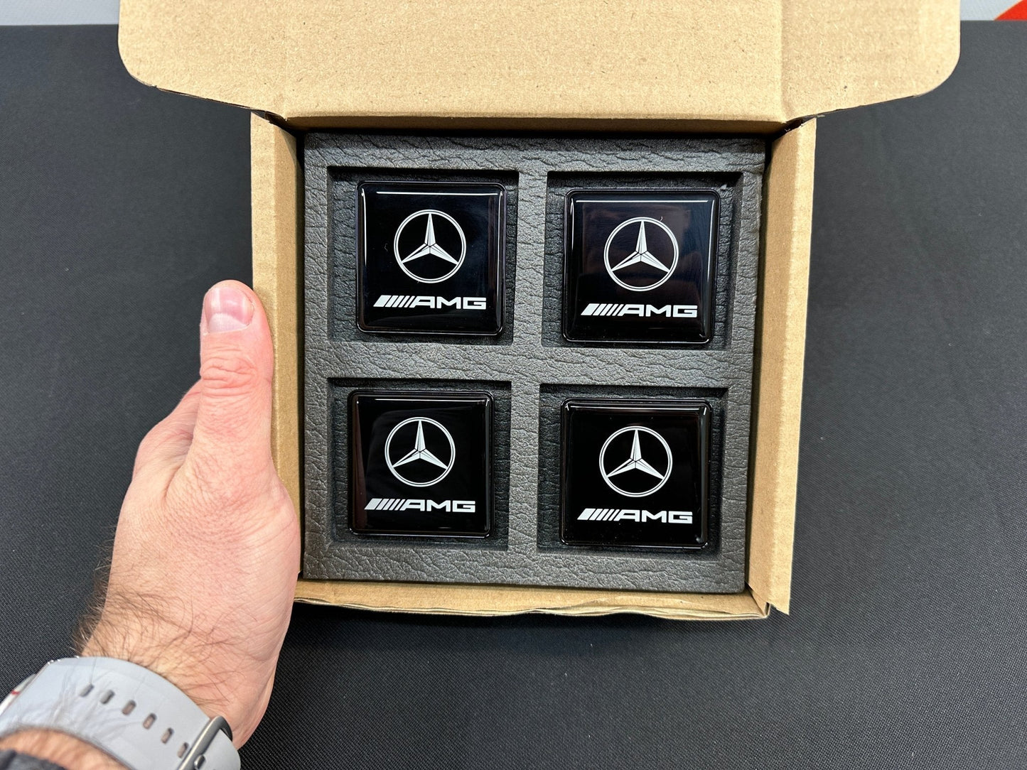 Seats Emblem set in black color with AMG Mercedes-Benz logo