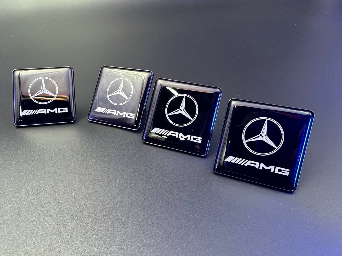 Seats Emblem set in black color with AMG Mercedes-Benz logo