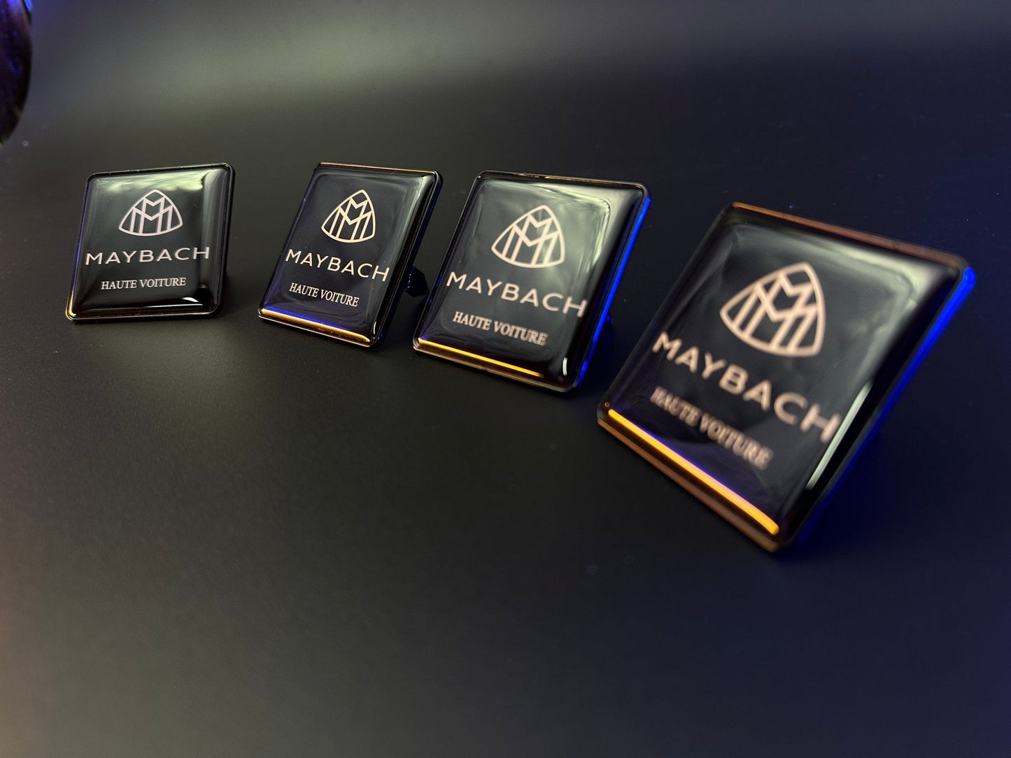 Seats Emblem set in black color with Maybach Haute Voiture logo for Mercedes-Benz
