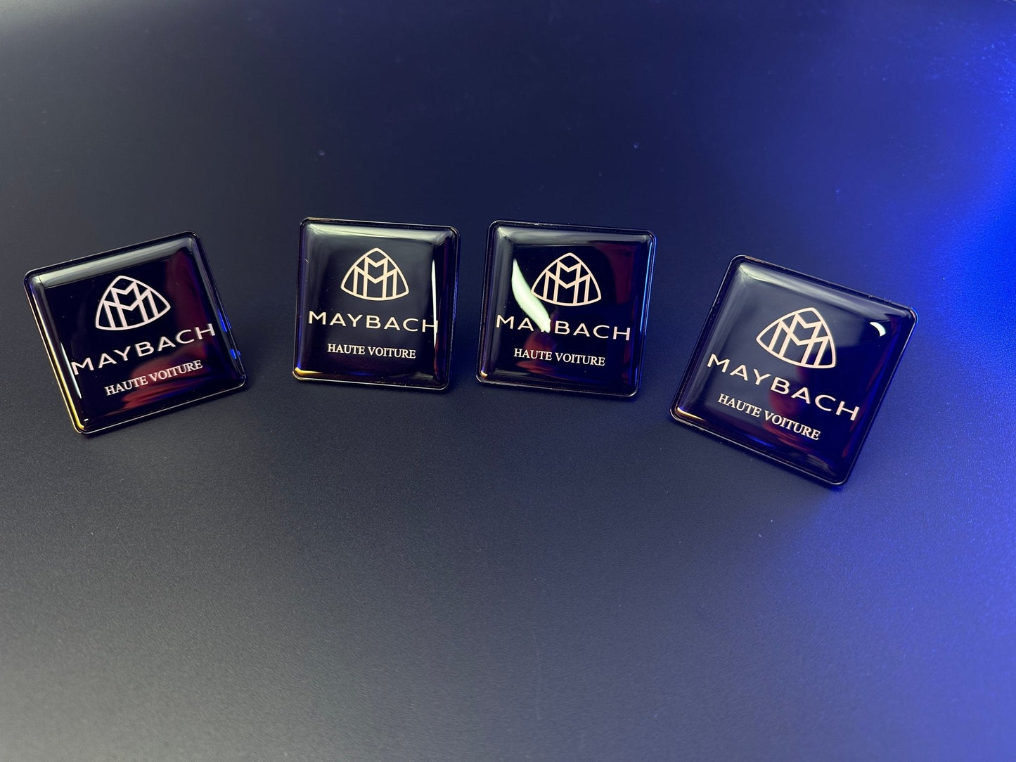 Seats Emblem set in black color with Maybach Haute Voiture logo for Mercedes-Benz