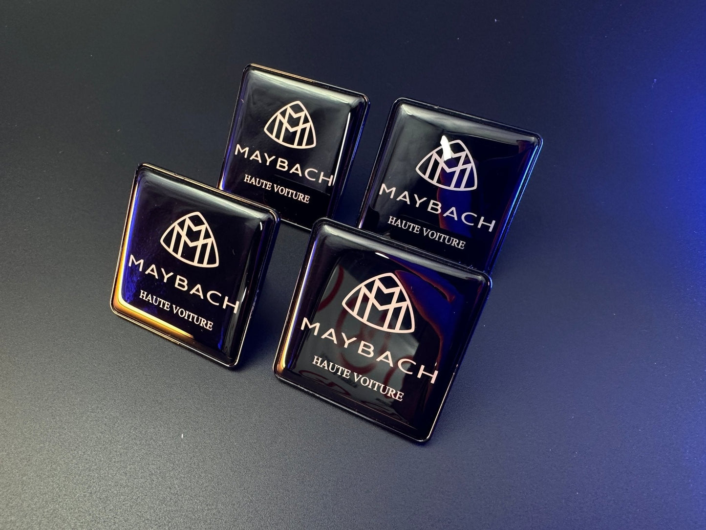 Seats Emblem set in black color with Maybach Haute Voiture logo for Mercedes-Benz