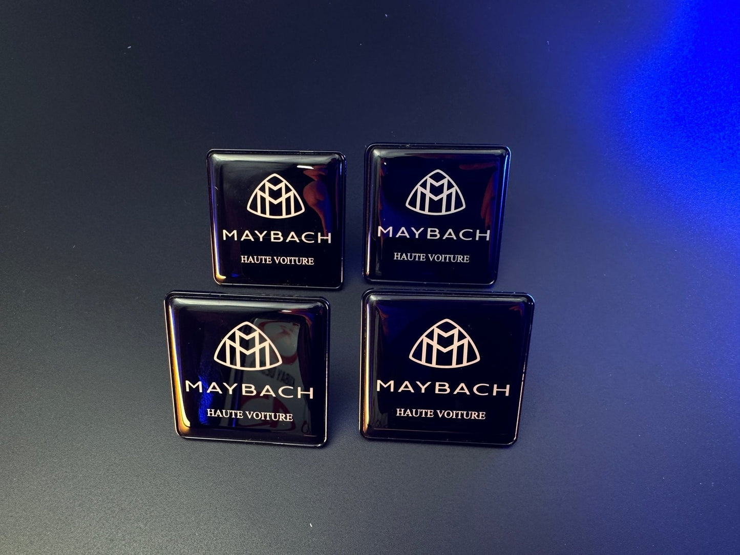 Seats Emblem set in black color with Maybach Haute Voiture logo for Mercedes-Benz