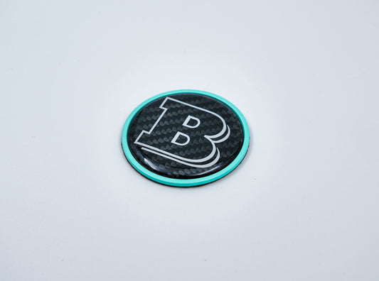 2-component metal carbon Tiffany blue Brabus badge logo emblem 55mm for hood scoop of Mercedes-Benz W463, W463A, W464 G-Class.