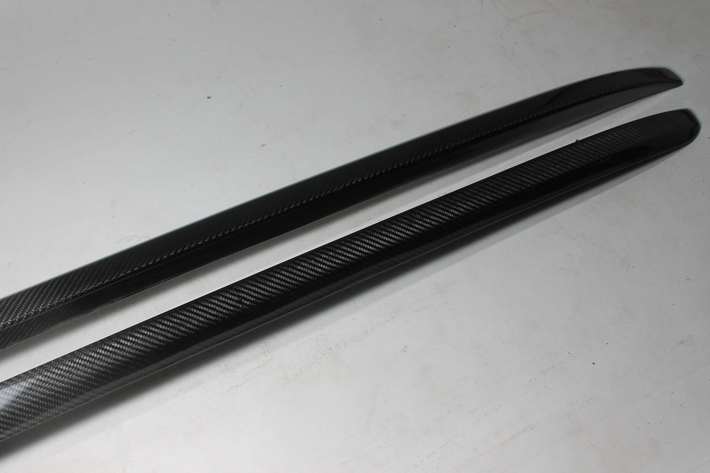 Carbon handrail (top trim) roof rails for Bentley Bentayga 2015-2018 from Tuning Shop, featuring genuine carbon fiber with a grey gloss UV-resistant finish.