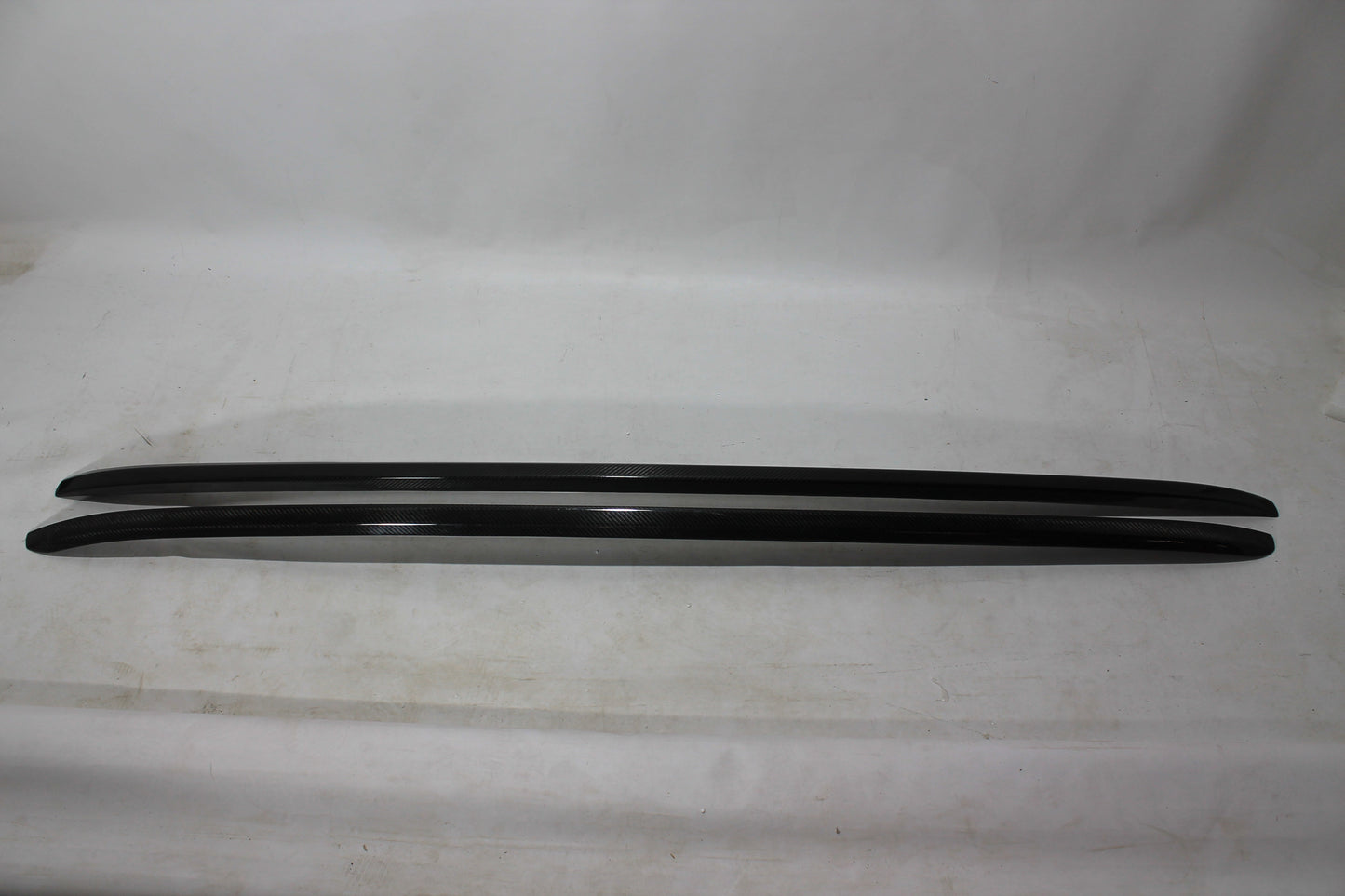 Carbon handrail (top trim) roof rails for Bentley Bentayga 2015-2018 from Tuning Shop, featuring genuine carbon fiber with a grey gloss UV-resistant finish.