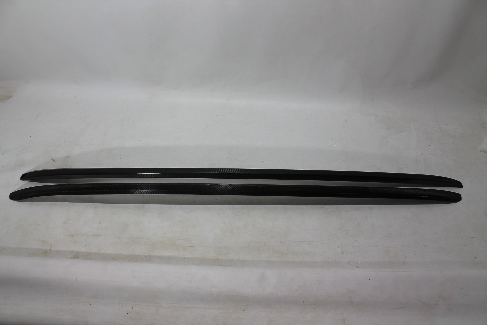 Carbon handrail (top trim) roof rails for Bentley Bentayga 2015-2018 from Tuning Shop, featuring genuine carbon fiber with a grey gloss UV-resistant finish.