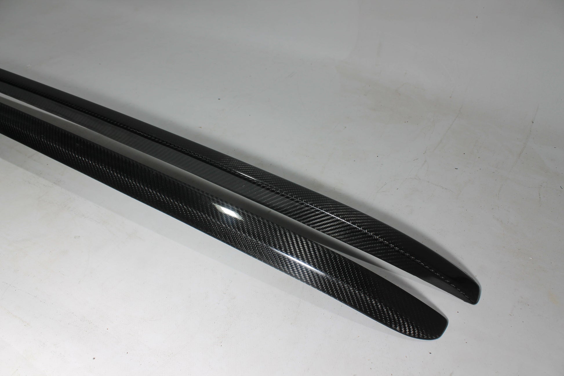 Carbon handrail (top trim) roof rails for Bentley Bentayga 2015-2018 from Tuning Shop, featuring genuine carbon fiber with a grey gloss UV-resistant finish.