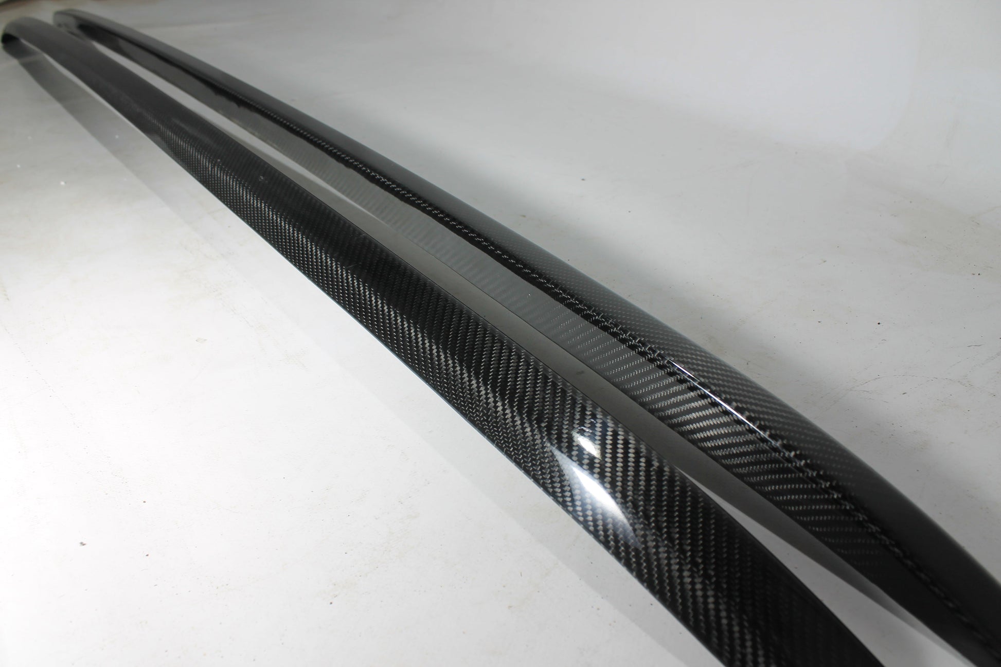 Carbon handrail (top trim) roof rails for Bentley Bentayga 2015-2018 from Tuning Shop, featuring genuine carbon fiber with a grey gloss UV-resistant finish.