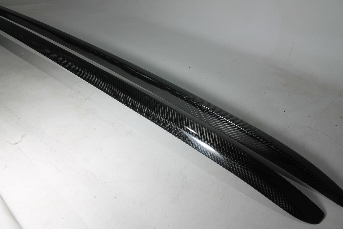 Carbon handrail (top trim) roof rails for Bentley Bentayga 2015-2018 from Tuning Shop, featuring genuine carbon fiber with a grey gloss UV-resistant finish.