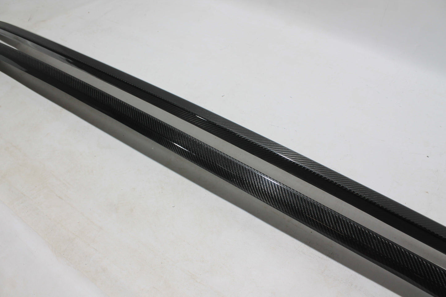 Carbon handrail (top trim) roof rails for Bentley Bentayga 2015-2018 from Tuning Shop, featuring genuine carbon fiber with a grey gloss UV-resistant finish.