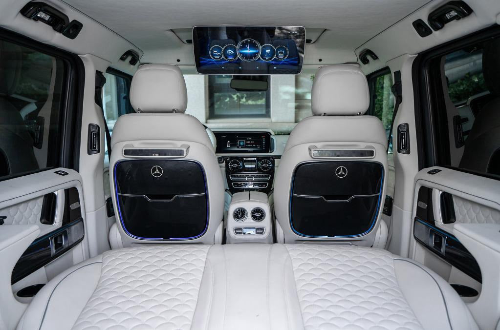 Interior seatback trim with reclining tables, LED lighting and wireless charging for Mercedes G Class W463A