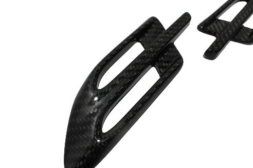 Side vents covers 2-piece set for Bentley Bentayga 2015-2018, made from genuine carbon fiber with a grey high-gloss finish.