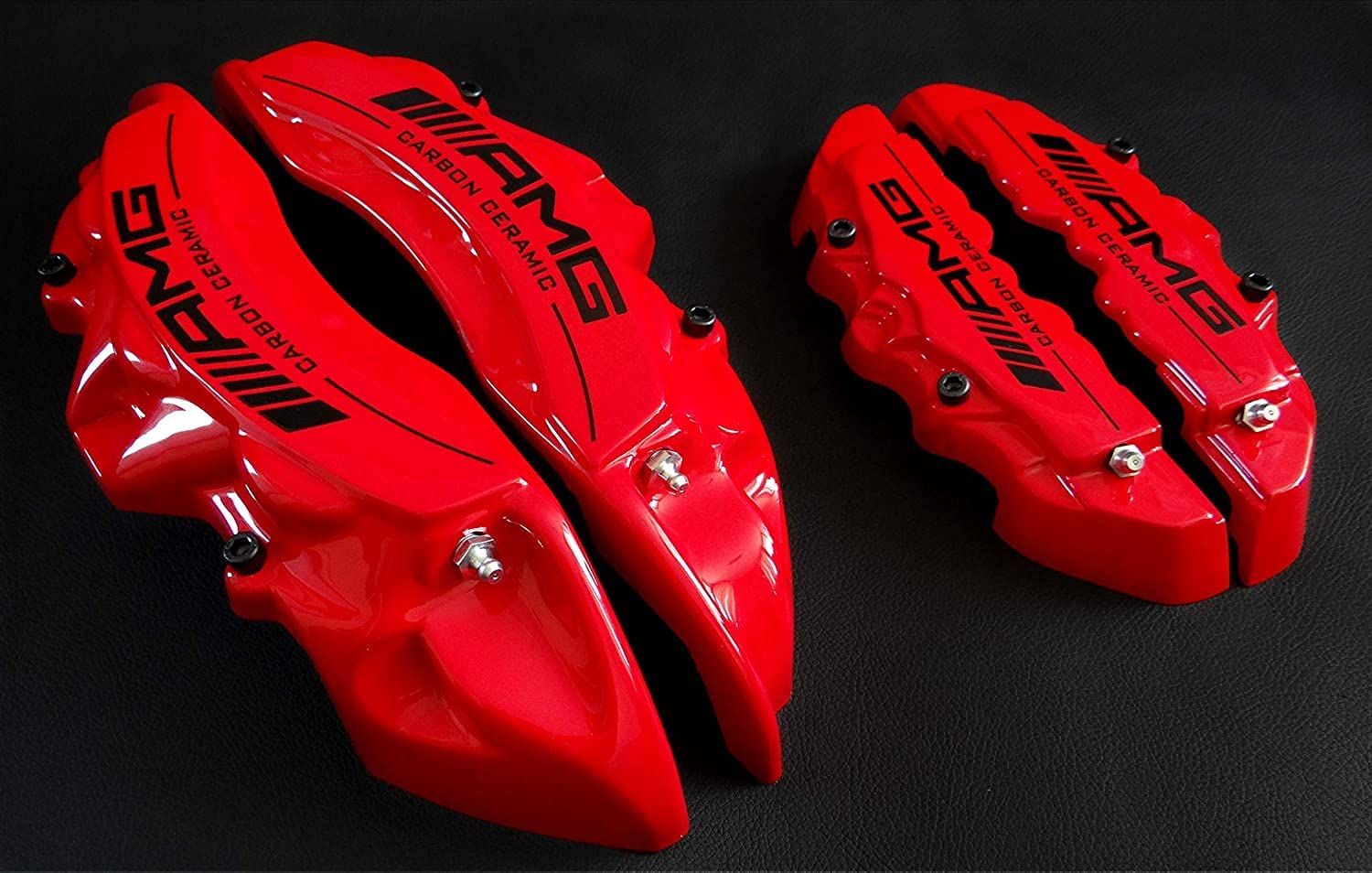 AMG Red Disc Caliper Covers with Carbon Ceramic Sign, 4 pcs set for Mercedes-Benz G-Wagon W463 from Tuning Shop, made of fiberglass reinforced plastic.