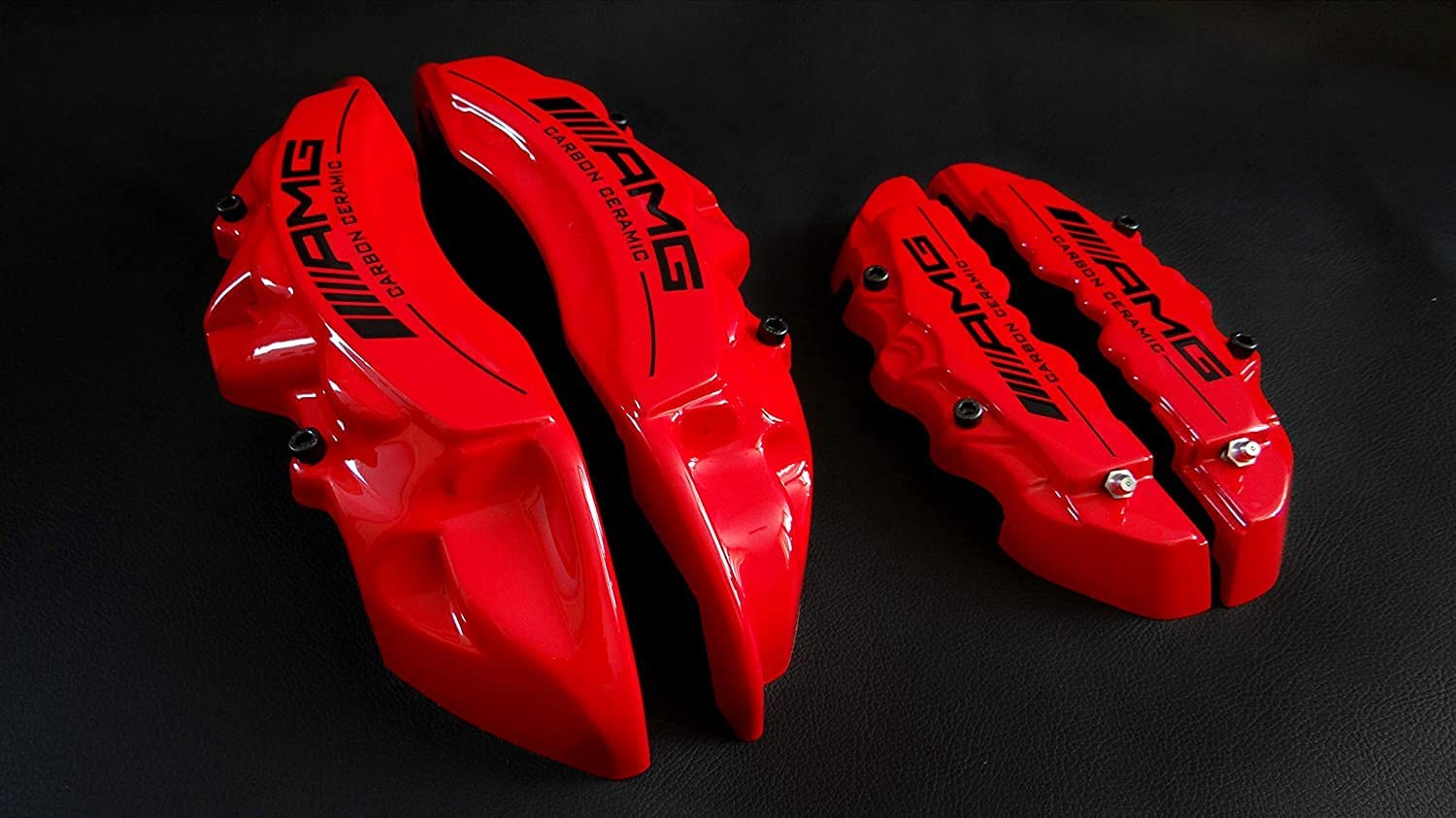 AMG Red Disc Caliper Covers with Carbon Ceramic Sign, 4 pcs set for Mercedes-Benz G-Wagon W463 from Tuning Shop, made of fiberglass reinforced plastic.