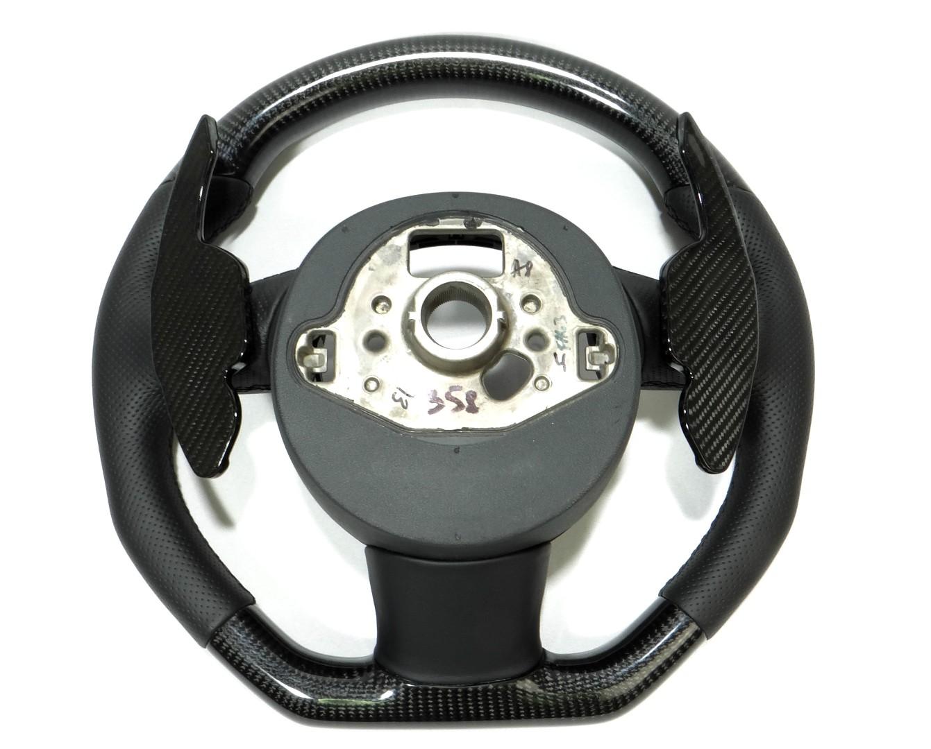 OEM remanufactured Audi A4 S4 A5 S5 Q5 SQ5 Q7 RS5 RS6 steering wheel with carbon fiber, perforated black leather, flat bottom, and carbon paddle shifts from Tuning Shop.