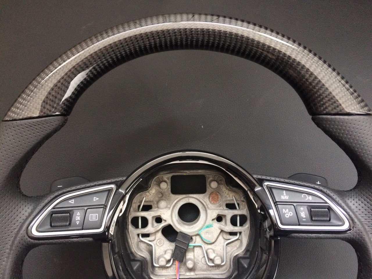 OEM remanufactured Audi RS6 RS4 RS5 RS7 SQ5 S4 S5 steering wheel with carbon fiber and perforated black leather from Tuning Shop.