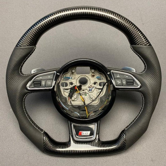 OEM remanufactured Audi S8 steering wheel with carbon fiber, perforated black leather, flat bottom, and piano black center from Tuning Shop.