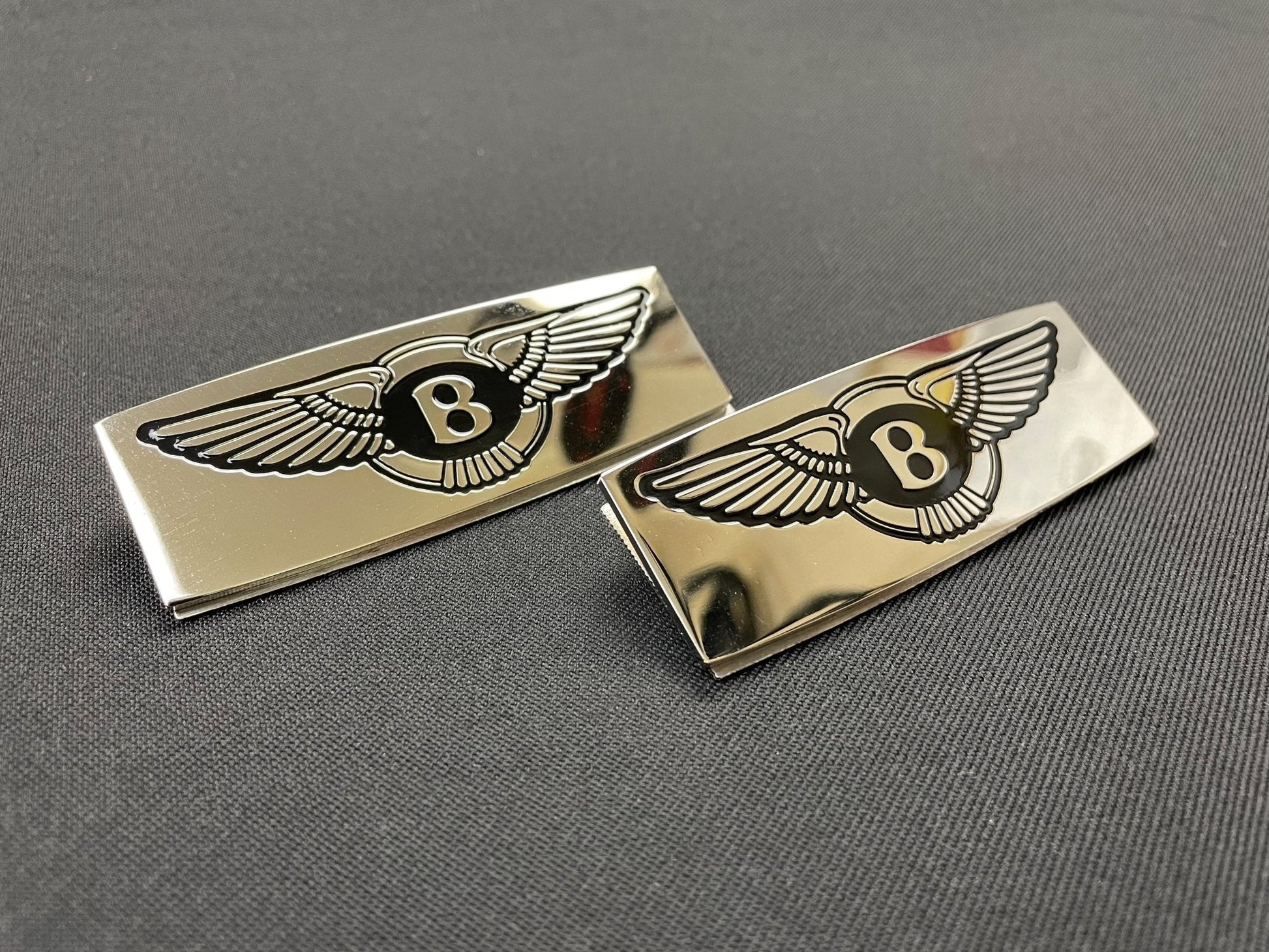 Metal chrome glossy floor mats badges emblems for any Bentley model, 2 pcs set from Tuning Shop, made of stainless steel with a high-quality detailed finish.