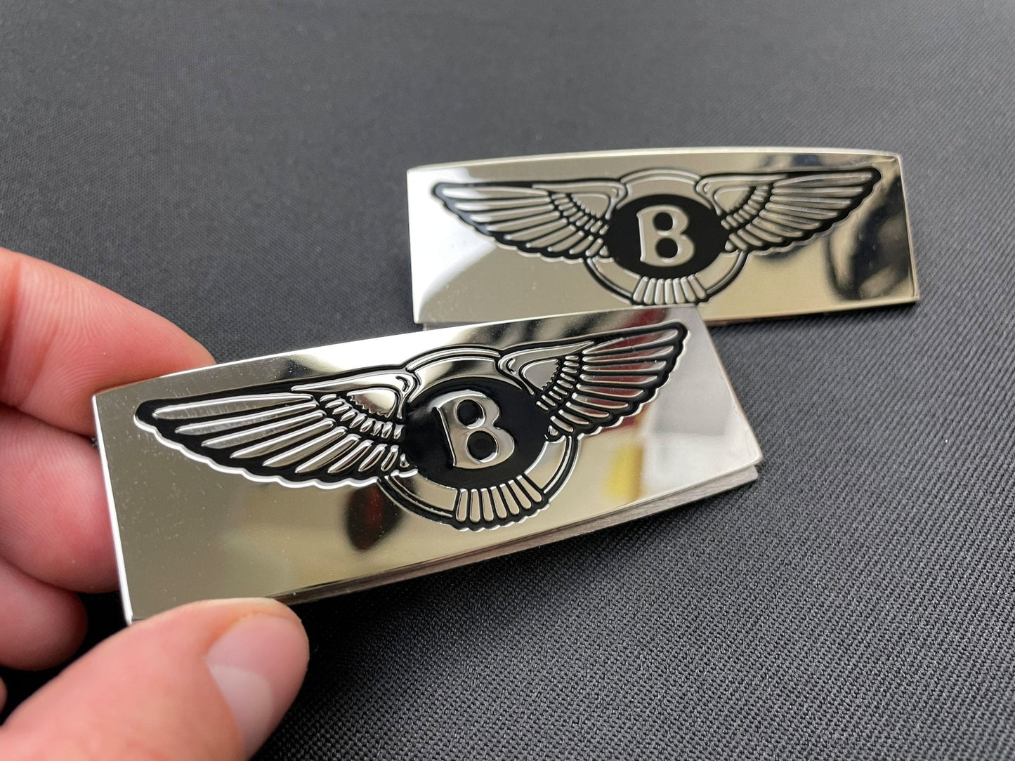 Metal chrome glossy floor mats badges emblems for any Bentley model, 2 pcs set from Tuning Shop, made of stainless steel with a high-quality detailed finish.