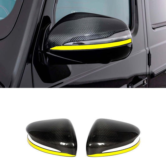 Carbon Mirror Covers with Yellow Stripe for Mercedes-Benz G-Class W463A W464 G63 from Tuning Shop, featuring genuine carbon fiber and a UV-resistant coating.