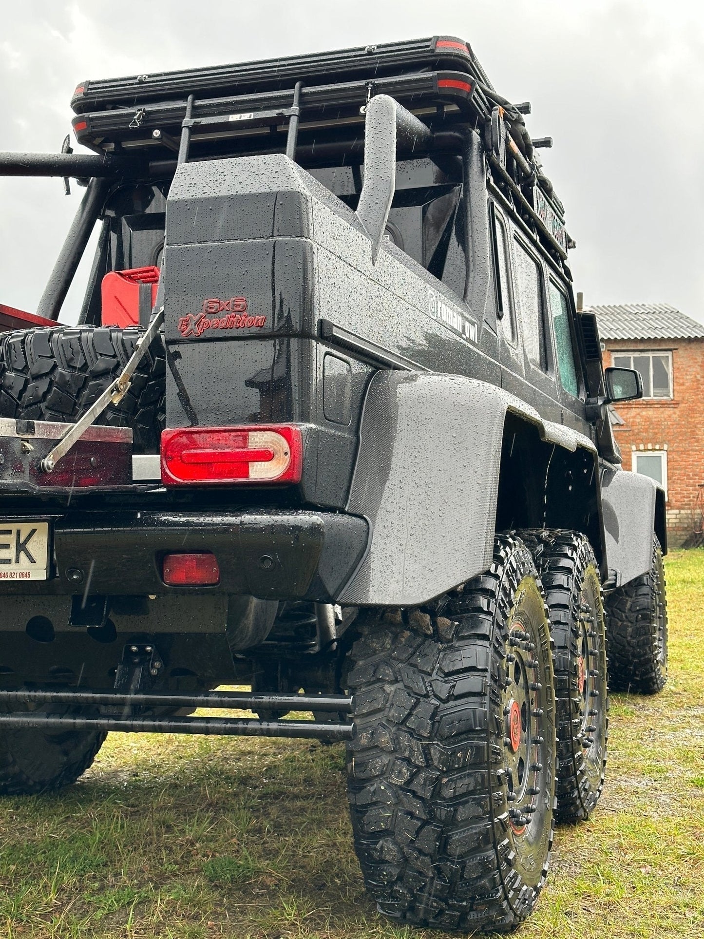 6x6 Expedition Emblem Logo 2-Component Red Metal with Carbon for Mercedes W463 6x6 from Tuning Shop, high-quality metal and carbon construction.