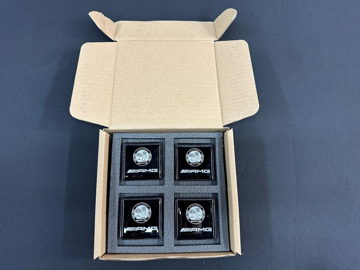 Seats Emblem set in black color with AMG Affalterbach logo for Mercedes-Benz