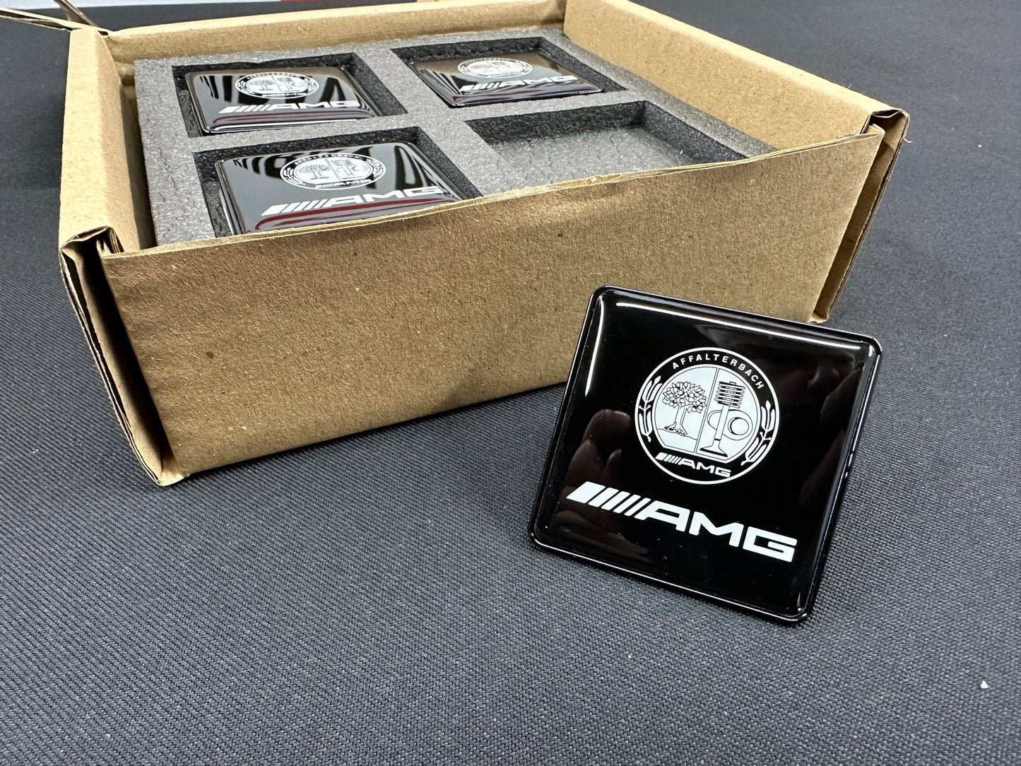 Seats Emblem set in black color with AMG Affalterbach logo for Mercedes-Benz