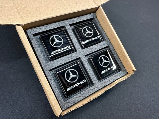 Seats Emblem set in black color with AMG Mercedes-Benz logo